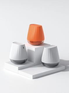 an orange and white object sitting on top of a table