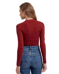 Get ready to run to this mock neck long sleeve sweater top in oxblood! The perfect combination of fashion and function, this top will keep you warm and stylish on any chilly day. With a playful mock neck and trendy oxblood color, you'll be sure to turn heads while staying cozy. (And bonus points for the clever wordplay!) 80% Viscose 20% Nylon Trendy Mock Neck Top For Winter, Winter Mock Neck Top For Layering, Versatile Long Sleeve Top For Winter, Trendy Mock Neck Top For Winter Workwear, Trendy Long Sleeve Mock Neck Top For Work, Trendy Mock Neck Top For Work In Winter, Stretch Mock Neck Top For Fall, Trendy Turtleneck For Layering With Crew Neck, Fall Mock Neck Top For Layering