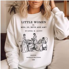 Introducing the must-have piece for all bookworms, literature lovers, and Little Women fans - the Little Women sweatshirt! This unique and stylish sweatshirt features original illustration and the first page of Chapter 1 on the back. If you are a Little Women lover or simply appreciate classic literature, this sweatshirt is a must-have addition to your wardrobe. Featuring a one-of-a-kind design, this Little Women sweatshirt showcases a special touch with the first page of Playing Pilgrims Chapte Bookish Sweatshirt With Letter Print And Crew Neck, Bookish Cotton Sweatshirt With Letter Print, Cotton Letter Print Bookish Sweatshirt, Literary Long Sleeve Tops With Letter Print, Literary Long Sleeve Cotton Tops, Literary Shirts, Women Sweatshirt, Literary Gifts, Little Women