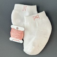 Custom embroidery socks done by hand! The stitch will be place on the outside of each sock.  The color of the thread for the letter will be used as the color for both socks.   Socks are from old navy! They are ankle  Socks are listed as one pair (2 socks) PLEASE NOTE all initials will be capitalized and only ONE letter per order. Shown in pictures above. because of the size of 0-6 months socks, the stitches will go below the ankle band Handmade White Socks For Gifts, Handmade White Socks For Gift, Handmade White Socks As Gift, Embroidered Baby Clothes, Embroidery Socks, Embroidered Socks, Embroidery Sweater, Toddler Accessories, Socks Gift