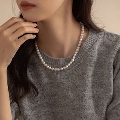 Indulge in luxury with our Natural Mabe Pearl Double Layered Necklace. This sophisticated piece is the perfect gift for her, combining elegance and beauty. The natural pearl adds a touch of exclusivity, making this necklace a truly unique and timeless addition to any collection. Material: 18K White Gold Plated Copper Stone: Cubic ZirconiaPearl: Mabe PearlNecklace 1: 6mm 17 Inch Round PearlNecklace 2: 8mm 17 Inch Round PearlThis necklace is made of 6mm and 8mm , which are strung on a silk thread. The pearls are a classic white color and have a high luster.Introducing our exquisite collection of high-end faux pearl necklaces, a perfect blend of sophistication and versatility. A clasp adorned with an infinity symbol, allowing you to wear the two necklaces together for a bold statement or sepa Pearl White Beaded Necklaces With Clavicle Chain, Feminine Pearl White Pearl Necklace, Pearl Necklace With Round Beads For Jewelry Making, Pearl White Pearl Clavicle Chain Jewelry, Pearl White Round Pearl Necklace, Classic Pearl White Necklace With Clavicle Chain, Pearl Clavicle Chain Jewelry With Round Beads, Pearl White Clavicle Chain Necklace, Elegant Round Pearl Chain Beaded Necklace