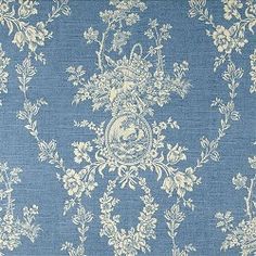 a blue and white wallpaper with flowers on it