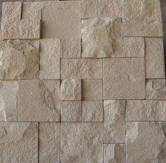 a pile of stone blocks sitting on top of a table