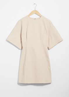 Mini dress featuring short, wide sleeves and a fitted waistline.• Round neckline• Length of dress:85.5cm / 33.7" (Size S) Chic Short Sleeve Dress With Flutter Sleeve For Spring, Chic Short Sleeve Mini Dress For Work, Formal Summer Mini Dress With Flutter Sleeves, Chic Flutter Sleeve Midi Dress For Work, Spring Midi Mini Dress With Structured Shoulders, Spring Mini Dress With Structured Shoulders For Work, Spring Workwear Mini Dress With Structured Shoulders, Chic Midi Dress With Flutter Sleeves For Work, Chic Workwear Midi Dress With Flutter Sleeves