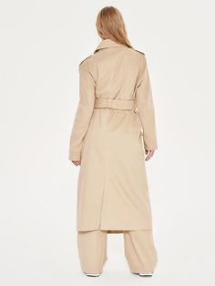 Everyone should have this Extro&Vert Women‘s Belted Trench Coat in their wardrobe. Versatile, structured, classic and ready for all sorts of weather conditions. Cut mid-length, this belted trench coat has the ability to make every outfit feel elevated and polished. Crafted with double-breasted button fastening, military shoulder epaulettes and belted waist. Model: Height 5’9“ / Bust 32½B / Waist 25” / Hips 37“ / UK Size 8. Designed in the UK. Dry clean only. Small: UK 6 - 8 / US 2 - 4Medium: UK