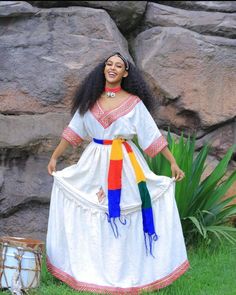 Experience the vibrant celebration of Ashenda with our beautiful Ethiopian and Eritrean cultural festive dress. This stunning ensemble features traditional patterns and rich colors, embodying the spirit of this joyous occasion. Complete your look with our carefully curated accessories, including elegant jewelry and headpieces, to capture the true essence of Ashenda. Whether you're participating in the festivities or simply appreciating the rich cultural heritage, this outfit is perfect for showcasing the beauty and tradition of the event. Festival Dresses With Woven Motifs, Traditional Dresses With Multicolor Embroidery And Woven Motifs, Bohemian Dresses With Pallu For Festivals, Bohemian Style Habesha Kemis For Eid, Bohemian Style Habesha Kemis For Eid With Traditional Drape, Bohemian Habesha Kemis For Eid With Traditional Drape, Bohemian Traditional Wear With Floor-length Patterns, Bohemian Traditional Wear With Floor-length Traditional Patterns, Folk Style Dresses With Woven Motifs For Festive Occasion