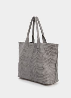 This gray leather tote bag is amazing to carry with style everything you need every day, no matter how many things you carry on. Boost your look with its elegant and timeless design. If you are looking for a unique, large, gorgeous, lightweight, and practical bag, you have already found it!  The Maxi Bag is an exclusive leather shopper bag handmade in our atelier with embossed cow leather + crocodile effect. The crocodile embossed makes the cow leather look like crocodile skin with its beautiful Rectangular Leather Bag With Crocodile Pattern, Leather Bags With Crocodile Pattern And Rectangular Shape, Casual Leather Shoulder Bag With Crocodile Pattern, Trendy Everyday Crocodile Pattern Satchel, Trendy Crocodile Pattern Satchel, Crocodile Pattern Tote Shoulder Bag For Errands, Top Handle Bag With Crocodile Pattern For Daily Use, Leather Bags With Crocodile Pattern And Double Handle, Leather Bag With Crocodile Pattern For Daily Use