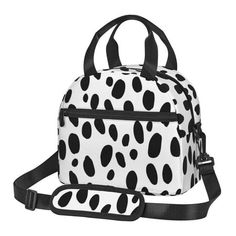 a black and white polka dot print backpack