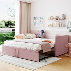 a child's bedroom with a pink bed and toy animals on the rugs