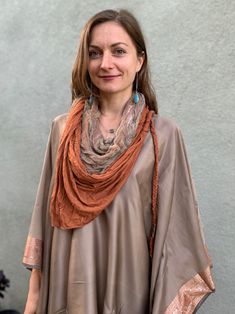 This beautiful desert shawl is a one of the kind creation. It can be worn as a headpiece, a belt, a scarf or a wrap. It comes with two detachable layers: a gauze cotton, hand-dyed by Lunara Love herself, and a stretch cotton jersey layer. This gorgeous beduin style desert scarf is lovingly hand crafted by Lunara Love of Lunara Design for our collaborative collection "Nomad Life" Being a nomad is like being a free spirit, a desert dweller who is ready to let go of the things that don't really mat Bohemian Hand Dyed Scarves For Summer, Bohemian Brown Shawl Dupatta, Bohemian Hand-dyed Scarves For Summer, Bohemian Pashmina Scarves, Bohemian Pashmina Scarf One Size, Bohemian Shawl For Layering, Bohemian Silk Dupatta Shawl, Bohemian Pashmina Silk Scarf Dupatta, Bohemian Brown Silk Shawl Scarf