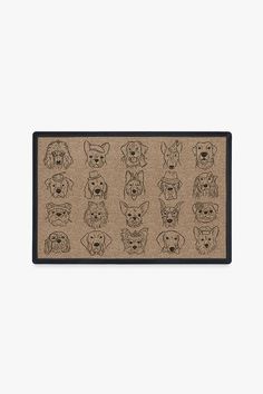 a door mat with dogs drawn on the front and back of it in different sizes