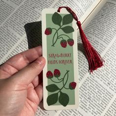 a bookmark with berries on it and the words straw - berry fields forever written in red