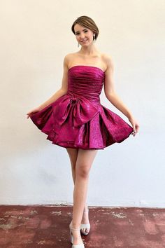 Strapless Fuchsia Ruched Short Dress with Bow Gala Mini Strapless Dress With Ruched Bodice, A-line Mini Dress With Bow For Prom, Satin Ruched Corset Dress For Party, Ruched Satin Corset Dress For Party, Satin A-line Mini Dress With Ruched Bodice, Satin Mini Corset Dress For Evening, Fit And Flare Mini Corset Dress For Party, Cocktail Mini Corset Dress With Ruched Bodice, Prom Mini Dress With Pleated Bodice