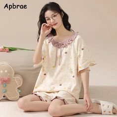 Upgrade your sleepwear with our Women's 100% Cotton High Quality Pajamas. Perfect for summer, these short-sleeved, shorts set will keep you cool and comfy all night long. With a cute Kawaii bear design, you'll not only look stylish, but feel cozy and cute. Upgrade your loungewear game now! Kawaii Cotton Sleepwear For Summer, Kawaii Sleepwear For Summer Pajama Party, Kawaii Summer Sleepwear For Pajama Party, Kawaii Summer Sleepwear For Loungewear, Cute Summer Pajama Shorts For Sleepovers, Kawaii Summer Pajama Party Sleepwear, Kawaii Summer Sleepwear, Summer Sleepover Short Sleeve Sets, Cute Summer Sleepwear Sets