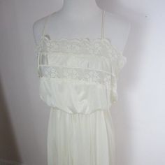 Authentic USA Union Made Flair 1940's Cream Slip Blouson Top Goddess Long Nightgown Women's Size M - underarm to underarm 19", waist stretches up to 19" laying flat, hips 21" laying flat, length 56" Lace Trim on Bodice and Hem Spaghetti Straps Elastic Empire Waist Silky Nylon - Machine Wash Very Good Vintage Condition - no issues White Flowy Vintage Maxi Dress, Vintage White Flowy Maxi Dress, Vintage Summer Wedding Night Dress, Vintage Cream Nightgown For Sleep, Vintage Cream Nightgown, Vintage White Sleeveless Maxi Dress, Vintage White Nightgown For Summer, Vintage Sleeveless Cream Nightgown, Vintage Cream Sleeveless Nightgown