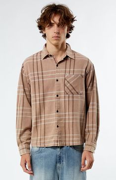 Stay stylish and comfortable with the Washed Cropped Flannel Shirt from PacSun. Featuring a trendy cropped design, this shirt boasts a classic flannel pattern and a soft, washed finish for a laid-back, vintage vibe.


	Collared neckline
	Long sleeves
	Cropped fit
	Flannel plaid pattern
	Dual chest pockets
	100% Cotton
	Machine washable
	Model is wearing size medium
	Model Measurements: 6’3” Height, 28” Waist, 33.5” Hips Trendy Flannel Long Sleeve Shirt, Casual Brown Relaxed Fit Flannel Shirt, Trendy Flannel Shirt For Spring, Trendy Spring Flannel Shirt, Casual Brown Flannel Shirt, Casual Flannel Shirt For Spring, Trendy Flannel Button-up Shirt, Casual Flannel Shirt With Collar, Trendy Relaxed Fit Cotton Flannel Shirt