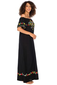 VIBRANT CUSTOM FLORAL EMBROIDERY gives this black off the shoulder Mexican maxi dress a brilliant splash of color. A gorgeous long sundress, beach dress, swimsuit cover up or resort wear OUR EXCLUSIVE EMBROIDERED THREE-TIER sleeves feature 3 rows of fabric, each one beautifully embroidered. Wear on or off the shoulders. Short sleeves provide upper arm coverage FLOWY LONG MAXI DRESS drapes gracefully for a flattering fit. Wear this bohemian tunic dress all day, or pair with heels for a night out. Sundress Beach, Mexican Embroidered Dress, Dress Swimsuit, Floral Dress Design, Bohemian Tunics, Long Sundress, Loungewear Dresses, Mexican Wedding, Three Tier