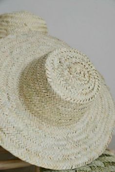 "Moroccan Palm Leaf Garden Hat, Round Straw hat, Traditional straw hat, 100% Natural palm leaf , handmade in Morocco, beach hat, summer hat INTRODUCTION : Handmade round straw hat for summer sun from morocco 100% natural . These hats are light weight and are great for protection from sunlight. They are great for summer, gardening or for strolling around town on a hot day. They can also act as deco when suspended on a wall. These hats are made of Dried palm leaves which are eco friendly. Each hat Morocco Beach, Garden Hat, Gardening Hat, Boho Brand, Handmade Slippers, Handmade Sellers, Beach Gifts, Hat Handmade, Beige Style