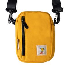 "Our new \"Daisy\" crossbody bag is the perfect everyday accessory. Made from high-quality 16oz washed yellow canvas, this durable bag features an adjustable shoulder strap and multiple compartments to keep all you bits and bobs in-check. \"Daisy\" Retro Inspired  Great gift Your new favorite accessory  Durable 16oz Washed Yellow Canvas Adjustable Shoulder Strap Multiple Compartments 7\" X 5\" X 2.25\" Quick Ship" Functional Yellow Shoulder Bag For School, Yellow Canvas Shoulder Bag With Removable Pouch, Yellow Canvas Bag With Pockets For Travel, Yellow Shoulder Bag With Cell Phone Pocket, Retro Yellow Shoulder Bag With Adjustable Strap, Yellow Canvas Shoulder Bag For Daily Use, Yellow Shoulder Bag With Adjustable Strap For School, Casual Yellow Canvas Bag With Adjustable Strap, Yellow School Shoulder Bag With Adjustable Strap