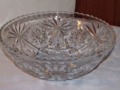 a glass bowl sitting on top of a table