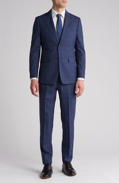 Sophisticated peaked lapels smarten the jacket of this trim-fit suit crafted from a fine wool blend and finished in a handsome windowpane plaid print. 36 1/4" inseam; 7 3/4" leg opening; 10 1/2" rise (size 38R) Jacket has peaked lapels; chest welt pocket; front flap pockets Unhemmed Lined 90% wool, 10% polyester Dry clean Imported Tailored Suits With Welt Pockets For Business Meetings, Professional Fitted Pantsuit With Pressed Crease, Fitted Professional Pantsuit With Pressed Crease, Classic Notch Lapel Sets For Business Meetings, Timeless Fitted Suits With Suit Collar, Timeless Fitted Suit With Flat Front, Timeless Fitted Flat Front Suit, Tailored Suits With Pressed Crease For Business Meetings, Tailored Suit With Pressed Crease For Business Meetings