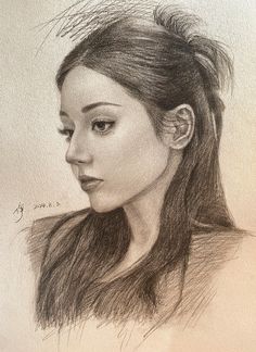 a pencil drawing of a woman's face