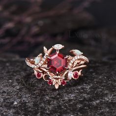 Item description ✦ Handmade, high-quality item! ✦ Material: 925 sterling silver, Solid 10k/14K/18K GOLD (can be made in white/rose/yellow gold) Engagement ring ✦ Center Stone: Lab Ruby ✦ Size/Weight: 6x6mm Hexagon Cut ✦ Side Stones: Marquise Cut Lab Opal and Marquise Cut/Round Cut Moissanites Wedding band ✦ Gemstones: Round Cut Lab Ruby Any ring size can be made,if the ring size is not in the option list ,contact me. As it is handmade,it needs 2-4 weeks to finish and then be shipped by usps or DHL. Return policy: We offer 30 days return policy. For any reason, if you are not completely satisfied with your order, you may return it for a refund.  Buyer is responsible for the handcraft fee (15%-30% of the total price) and the return shipping cost. Ruby Engagement Ring Set, Gemstone Rings Unique, Unique Engagement Ring Settings, Unique Opal, Ruby Engagement Ring, Moon Ring, Ring Art Deco, Yellow Gold Engagement, Classy Jewelry