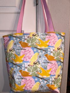 This is a cute tote bag I made with this sweet birdie fabric. It is fully lined with an inner pocket.  Measures approx 13" down the side seam. Opening is approx 15" laying flat (side seam to side seam). There is a 4" gusset on the bottom. Pink webbing for straps.   Machine washable gentle cycle. Tote Bag With Pockets, Cute Tote Bags, Etsy Accessories, Accessory Gift, Pet Supplies, Gift Card, Birds, Electronic Accessories, Tote Bag