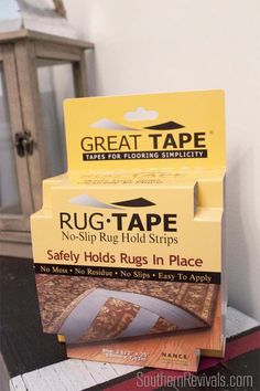 three boxes of rug tape stacked on top of each other