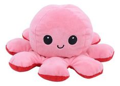 a pink stuffed animal with black eyes on it's face and an octopus like body