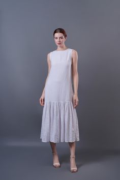 "Low Waist Linen Dress, Relaxed fit Linen Midi Dress Handmade linen dress, Linen Summer dress,  Women Linen Clothing - Dress length is 127cm (50 inches) - Mid-calf length for our model who is 174cm (5'9'') tall - Made from High quality linen, 100% pure linen, and only get better with time - Low Waistline - Unlined bodice, Please contact me if you want it lined - Handmade at our studio - Made to order.  - Made to measurement is an option! Please message us if you would like to discuss more. Please read carefully to choose the right size: * XS (UK 6, USA 2) Best for busts up to 32'' (81 cm). Best for waists up to 26\" (66 cm). * S (UK 8, USA 4) Best for busts: 32-33'' (81-84 cm). Best for waists 26-27\" (66-69 cm). * S/M (UK 10, USA 6, EURO 38) Best for busts: 33-34.5'' (84-88 cm). Best for Spring Linen Dress For Daywear, White Linen Dress For The Beach, Spring Daywear Linen Dress, White Ramie Linen Beach Dress, White Ramie Linen Dress For Beach, Beach Midi Linen Dress, White Ramie Beach Dress, Linen Sundress, Midi Length, Linen Sundress In Midi Length