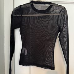 Alexanderwang.T Mesh Top Looks Great With A Bralette Or Tank. Chic Black Mesh Top With Mesh Sleeves, Black Mesh Top With Edgy Style, Black Mesh Crew Neck Top For Layering, Black Edgy Top With Mesh Sleeves, Edgy Black Mesh Top With Sheer Sleeves, Edgy Black Top With Mesh Sleeves, Black Mesh Top With Mesh Sleeves For Fall, Black Tops With Mesh Sleeves In Edgy Style, Black Stretch Mesh Top With Crew Neck