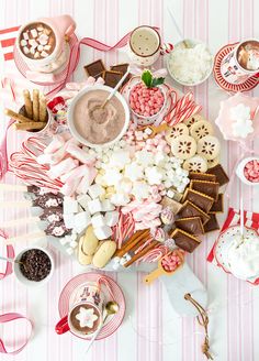 a table topped with lots of candy and candies