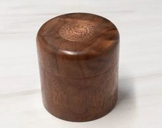 a wooden box sitting on top of a white counter