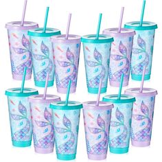 the frozen princess tumblers are lined up with their lids and straws on them