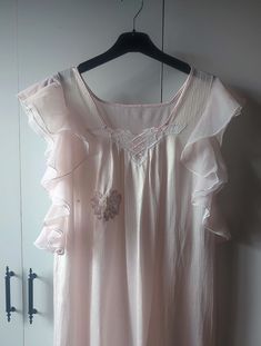 Vintage clothing, very light lavender pink nylon nightgown white lace neckline Dimensions were taken while they were straight. don't forget to double between the armpit to armpit about 22" doubled 44" waist 22" hips 23" length: 53- 54"" 135cm Material: polyester mix. no tag Condition: Used item. good conditon, There is wear on the right breast, sequin lace flower applique was sewn on it by me. The interior can be seen in the photos. There are slight thread pulls on the fabric. armholes are much Feminine Ruffled Nightgown For Sleep, Feminine Sleeveless Sleepwear For Wedding Night, Feminine Camisole Nightgown For Wedding, Sheer Feminine Camisole Nightgown, Pink Ruffle Dress For Bedtime, Feminine Sleeveless Nightgown For Wedding Night, Elegant Sleeveless Pink Sleepwear, Elegant Pink Sleeveless Sleepwear, Pink Camisole Dress For Night