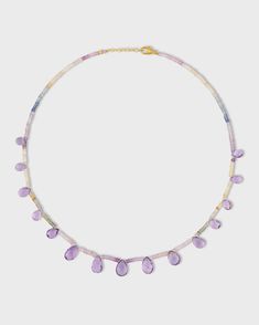 A delicate design with pastel sapphires and soft pink amethyst drops, this necklace captures an ethereal and serene aesthetic. The subtle hues of the gemstones together with the gold setting create a refined and calming look. 14 karat yellow gold Pastel Sapphire, Amethyst, 46 carats 16 to 77 inches length 3mm bead size Style # JJ-NAZ-404 UPC 810109741670 Faceted Amethyst Briolette Gemstones, Briolette Amethyst Natural Stone Gemstones, Tanzanite Briolette Gemstone Necklace, Purple Teardrop Multi-stone Jewelry, Multicolor Briolette Amethyst Jewelry, Faceted Lavender Briolette Jewelry, Amethyst Briolette Multi-stone Gemstones, Amethyst Multi-stone Briolette Gemstones, Amethyst Briolette Necklace With Faceted Beads