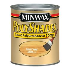 a can of paint that is yellow and brown