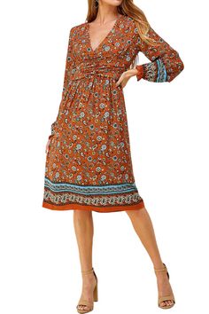 The Bohemian Printed Midi Dress from Iconic Luxe combines artistic flair, comfort, and practicality. Its unique design elements and Bohemian-inspired prints make it a standout choice for expressing your individual style. This dress is versatile and can be dressed up or down. It's suitable for casual outings, daytime events, or even dressed up for special occasions, depending on your styling choices. To complete your look, consider adding accessories such as delicate necklaces, oversized sunglass Bohemian Boho Print Midi Dress, Bohemian Midi Dress With Paisley Print, Bohemian Paisley Print Patterned Midi Dress, Hippie Patterned Printed Dress, Bohemian Printed Midi Dress, Bohemian Knee-length Printed Midi Dress, Vibrant Printed Fall Dress, Bohemian Patterned Printed Midi Dress, Bohemian Paisley Print Midi Dress For Fall