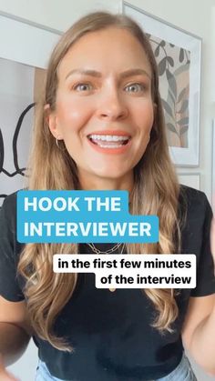 a woman with long hair is talking to the camera and has her hand up in front of her face