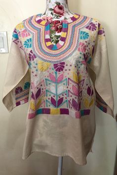 Mexican Hand Embroider Women's Blouse/Tunic. Refer to photos or message me for questions. Length: approx. 26" Width: approx. 22 1/2" Casual Multicolor Straight Kurta Top, Embroidered Multicolor Tunic, Multicolor Cotton Straight Kurta Blouse, Multicolor Embroidered Tunic For Spring, Multicolor Long Sleeve Tunic With Floral Embroidery, Multicolor Cotton Straight Kurta Top, Traditional Multicolor Straight Kurta Top, Traditional Long Sleeve Tunic With Multicolor Embroidery, Spring Cotton Tunic With Multicolor Embroidery