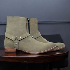 Handmade Men Beige  Harness Boots | Vintage 1990s Men's Biker Boot | Suede Leather Stone Engineer Boots | Men Buckle Motorcycle Rider Boots Description: Embrace vintage style with these Handmade Men's Beige Harness Boots. Inspired by classic 1990s biker boots, these boots feature a rugged design with a secure buckle, perfect for the modern motorcycle rider. Crafted from premium black leather, the stone engineer boots are built to withstand the demands of the road while offering a timeless, stylish look. These buckle motorcycle rider boots combine durability with style, making them a perfect addition to any wardrobe. The vintage design, coupled with high-quality materials, ensures long-lasting wear and comfort. Key Features: Material: Premium Beige leather for a rugged, stylish look. Vintag Fall Outdoor Moto Boots With Snip Toe, Vintage Leather Moto Boots For Streetwear, Fall Moto Boots For Biker Events With Snip Toe, Snip Toe Moto Boots For Biker Events In Fall, Fall Snip Toe Moto Boots For Biker Events, Engineer Boots Men, Modern Motorcycle, Mens Biker Boots, 1990s Men