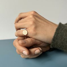 Meticulously crafted with balanced proportions and a polished finish, the Round Signet Ring is stunning in its simplicity. While it's beautiful in its plain form, this ring serves as a blank canvas to tell your story through engraving, diamonds, or gemstones of your choosing. Although perfect on any finger, the delicate design makes it an ideal choice for a pinky signet. Minimalist Engraved Initial Ring For Everyday Wear, Minimalist Engraved Initial Ring For Everyday, Minimalist Engraved Initial Ring With Round Band, Minimalist Engraved Ring For Everyday Wear, Minimalist Engraved Initial Round Band Ring, Everyday Timeless Sterling Silver Engraved Ring, Minimalist Rose Gold Rings With Single Cut Diamonds, Timeless Everyday Initial Ring, Minimalist Initial Ring With Engraving Option