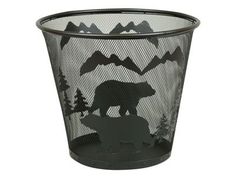 a metal trash can with a bear and mountain scene on it