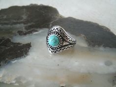 Turquoise Ring This beautiful silver plated ring has a turquoise setting and beautiful engraved design. Size 8. Southwestern Silver Turquoise Ring For Jewelry Making, Adjustable Bohemian Turquoise Ring With Stone Setting, Bohemian Sterling Silver Turquoise Ring Nickel Free, Handmade Western Style Silver Turquoise Ring, Bohemian Turquoise Rings With Stone Setting, Bohemian Silver Turquoise Ring With Stone Setting, Bohemian Turquoise Open Ring For Promise, Handmade Silver Turquoise Ring In Western Style, Bohemian Turquoise Open Promise Ring