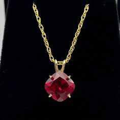 Beautiful Ruby & 14k Gold Necklace  * 5ct Cushion Cut Ruby measure 10mm x 10mm * 14k Yellow Gold * 16" or 18" Chain included - Select your Length Hallmarked & Gift Ready!    Matching Earrings and Ring available - message me for handling times and current gold pricing.  This Ruby is laboratory grown and is identical to the natural in every way, including, Chemistry, Composition & Hardness.  TIMELESS, BEAUTIFUL & UNIQUE FINE ART JEWELRY Ruby Jewelry Necklaces Gold, Ruby Jewelry Necklaces, Ruby Pendant Necklace, Ruby Necklace Pendant, Ruby Pendant, Fine Art Jewelry, Ruby Necklace, 14k Gold Necklace, Ruby Jewelry