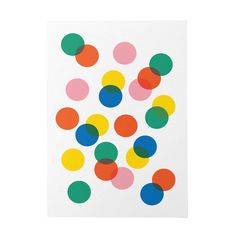 a white paper with multicolored circles on it