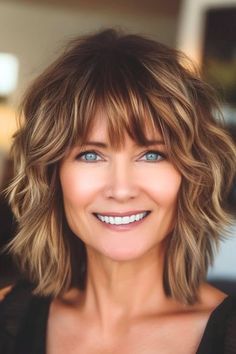 Save this pin for the best shag hairstyles for women over 50. Full of tousled texture, this choppy shag offers a playful take on the classic cut. The piecey layers give it that tousled look, making the hair feel lifted and full of movement. Women’s Layered Medium Hair, Messy Bob Hairstyles Choppy Layers, Joy Behar Hairstyles, Medium Shag With Bangs Over 50, Shag Haircuts For Wavy Hair, Mid Length Hair With Layers And Bangs Shag Hairstyles, Shag Without Bangs Hairstyles, Thick Hair Shag Haircut