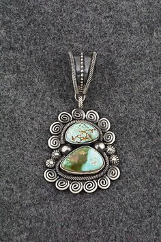 This stunning Royston turquoise and sterling silver pendant was made by Navajo silversmith Jess Martinez. The back is signed JM and stamped sterling. Length: 2 1/2" Width: 1 3/8" Free shipping on all orders! We ship with USPS and always include tracking. All orders ship within a day of payment. Returns are accepted up to 30 days after you receive your order. Just send us a message. Our shop offers cash back or store credit. The item must be returned in the same condition. Royston Turquoise, Contemporary Jewelry, Turquoise Sterling Silver, Turquoise Jewelry, Sterling Silver Pendant, Artisan Jewelry, Sterling Silver Pendants, Handcrafted Jewelry, Jewelry Inspiration