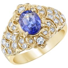 This unique ring is a Vintage-Inspired ring. It's beauty derives from the stunning Blue Sapphire that weighs 1.58 Carats and is adorned by 28 Round Cut Diamonds weighing 0.57 Carats. The total carat weight is 2.15 Carats. The Oval Cut Sapphire is 8 mm x 6 mm. It is crafted in 14 Karat Yellow Gold and is approximately 6.3 grams. The ring is a size 7 and can be resized, if needed, at no additional charge. Retro Engagement Rings, Rings Luxury, Round Sapphire, Platinum Diamond Rings, Modern Engagement Rings, Blue Sapphire Diamond, Diamond Cocktail Rings, Unique Ring, Halo Diamond Ring